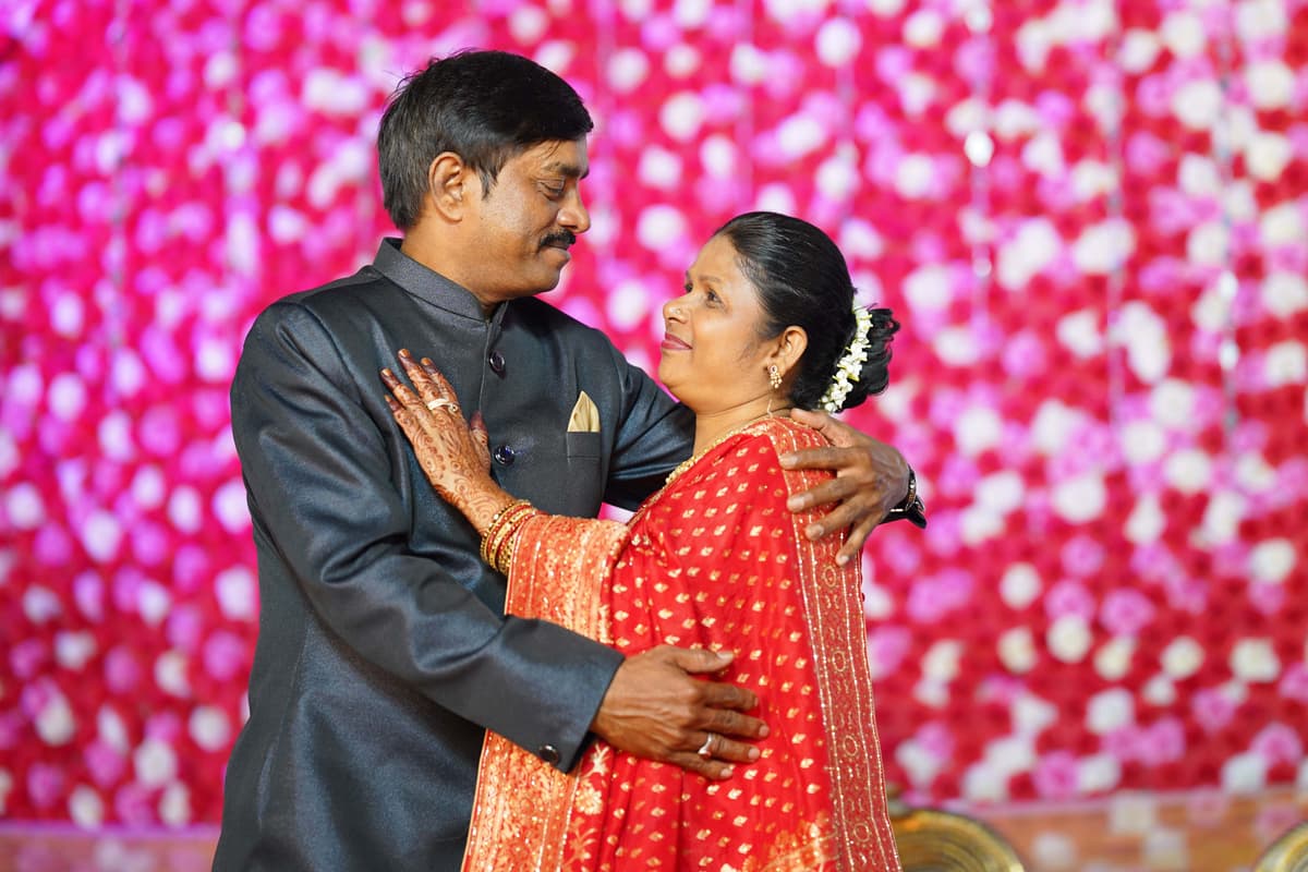 Wedding Photography - Romantic pose of bride parents