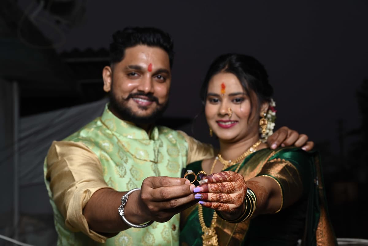 Wedding Photography - Bride and Grooom showing their engagement rings